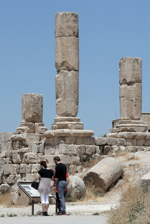 Tourists visit the Roman Theatre and the Citadel in downtown Amman on June 30 (AFP photos by Khalil Mazraawi)